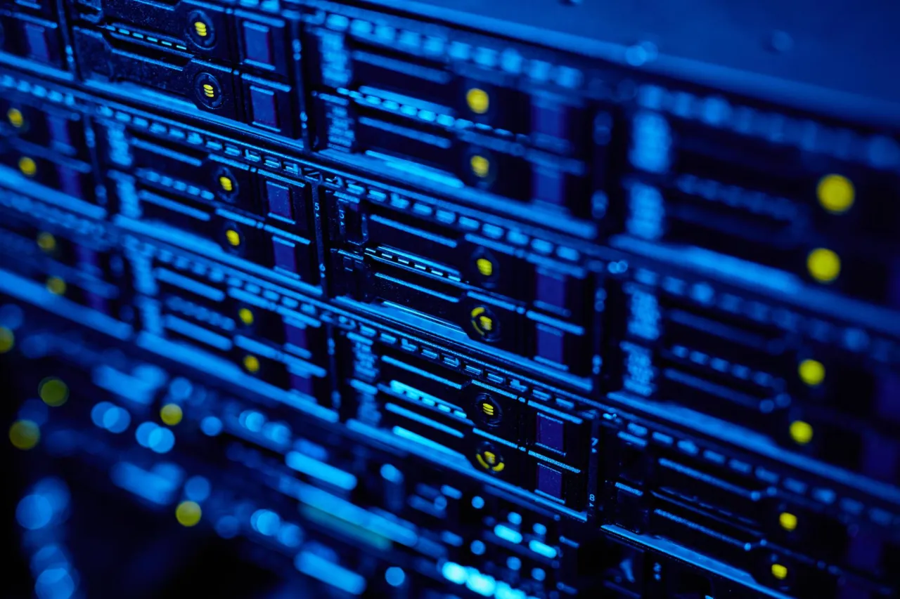 Server racks and network equipment lit in cool blue