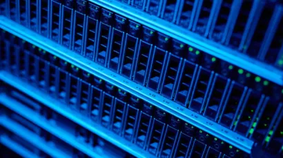 Server racks and a compliance file in a quiet Isle of Man office