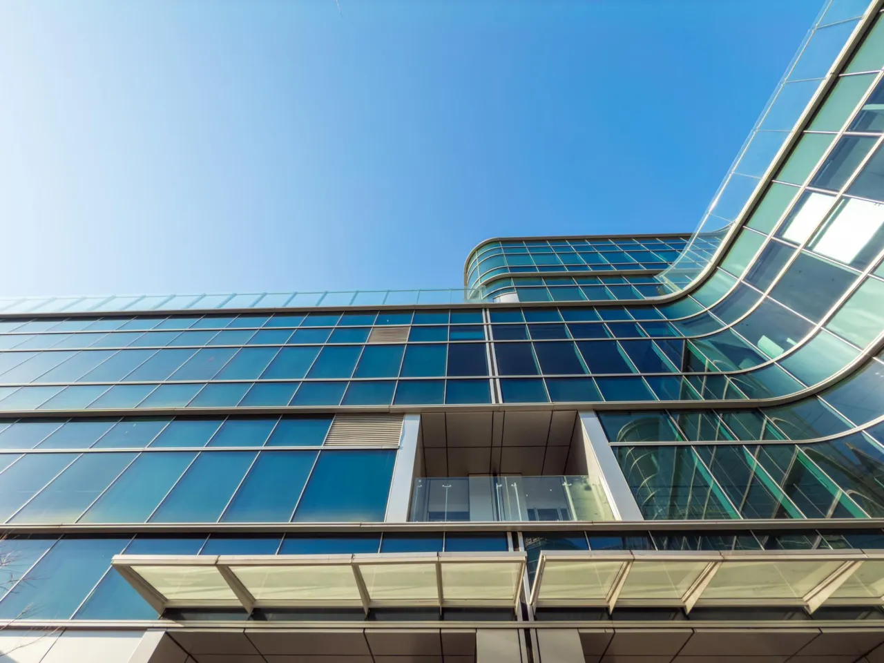 Isle of Man corporate building exterior in cool blue light