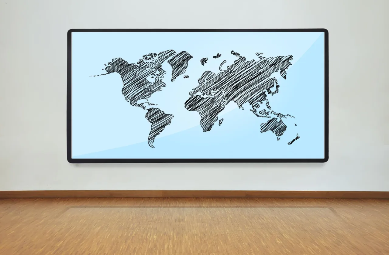 A world map on an office wall display, representing the Code's country-risk lists